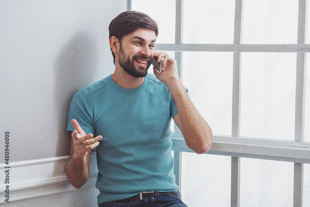 Poster Handsome man with gadget