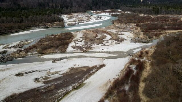 Isar, wild river near Munich and Wolfratshausen, Aerial drone shot in 4k, gravel bank, driftwood
