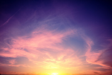 Colorful cloudy sky at sunset. Gradient color