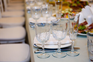 Banquet table served for guests. Cutlery and food at the reception party.