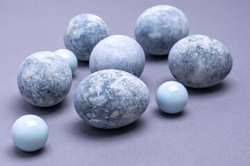 Close-up of Easter eggs of marble coloring on a gray background. Easter background.