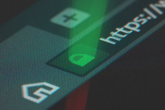 Web browser closeup on LCD screen with shallow focus on https padlock