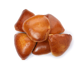 Delicious baked pirozhki on white background, top view