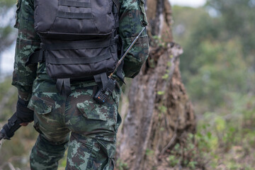 close up soldiers with gun.