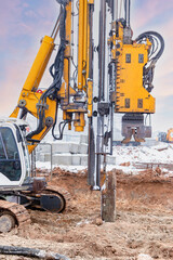 A powerful drilling rig for peeling at a construction site. Operation of the drilling rig in northern conditions. Pile foundations. Bored piles.