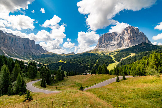 View of Sassolungo Langkofel mountain from Selva. Gardena Pass, Trentino Alto Adige, Italy. Gardena Pass with Sassolungo Passo Gardena, alpine pass between Val Badia and Val Gardena, South Tyrol Italy