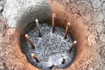 Bored pile in the ground after the device. Close-up. Pile foundations.