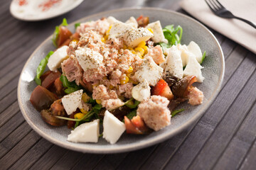 Closeup of salad with fish and vegetables for lunch