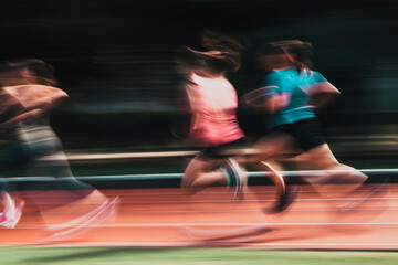 blurred image of runners in a competition