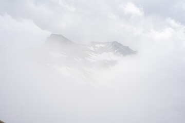 Alpine mountains in Austria. Grosglockner road in fog