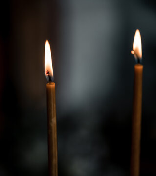 burning candle in the dark