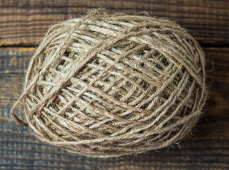 Hemp rope close up on wooden background