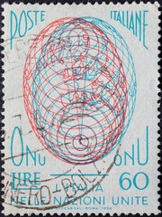 Obraz premium Italy - circa 1956: a postage stamp from Italy showing the Globe designed with three-dimensional effect. UN (United Nations) Membership