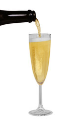 A glass glass into which champagne is poured from a dark bottle. Isolated on a white background, close-up