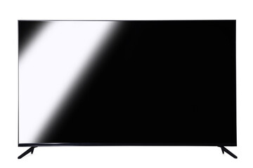 Modern TV on table against grey background