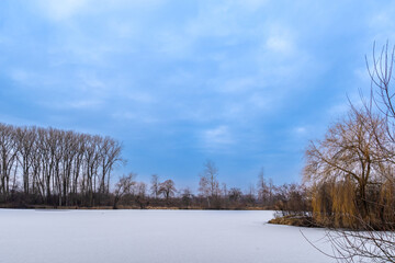 frozen natural lake in winter