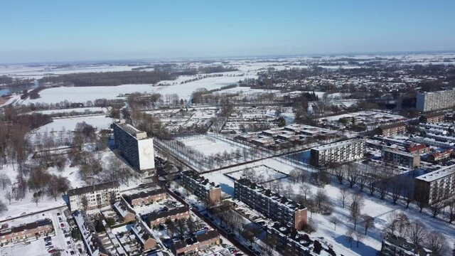 Winter aerial view of a snow covered residential community in Zwolle, Netherlands