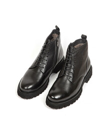 Men black winter leather boots with fur inside isolated on white background