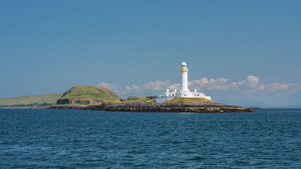 Lismore lighthouse on Eilean Musdile in the Firth of Lorne at the entrance to Loch Linnhe,...