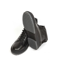 Men black winter leather boots with fur inside isolated on white background