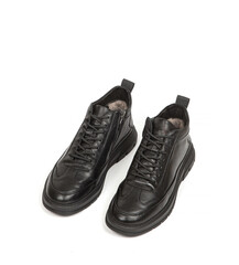 Men black winter leather boots with fur inside isolated on white background