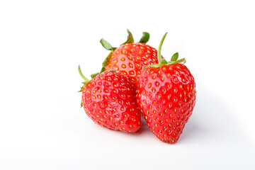 beautiful and ripe red strawberries on a white background