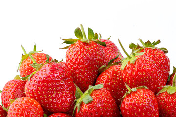 beautiful and ripe red strawberries on a white background