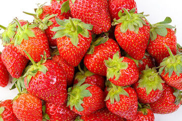 beautiful and ripe red strawberries on a white background