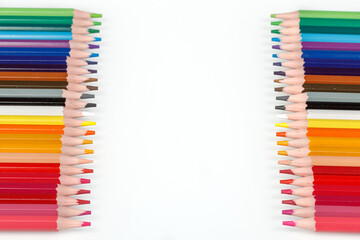 Multi-colored pencils in a row