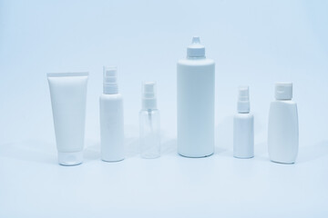 Set of plastic bottles (containers) for cosmetics on white background