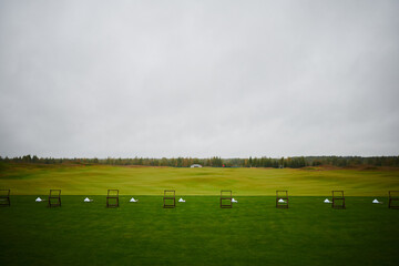 Golf range on green field