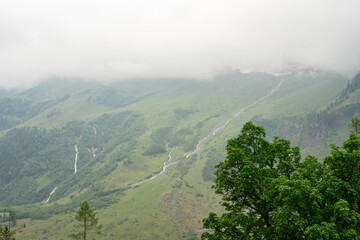 Alpine mountains in Austria. Grosglockner road in fog