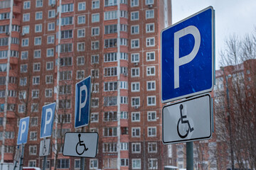 Fototapeta premium road sign in the residential sector parking only for the disabled