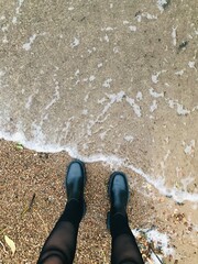 feet on the beach