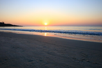 Beautiful Sea wave or white soft seawave surfs on white sand beach on island ,beautiful beach background