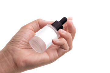 Woman holding serum bottle isolated on white background