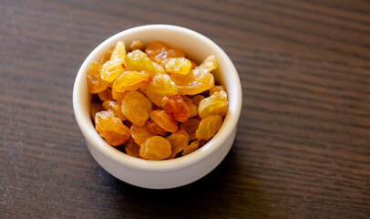 golden raisins close up in bowl