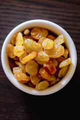 golden raisins close up in bowl