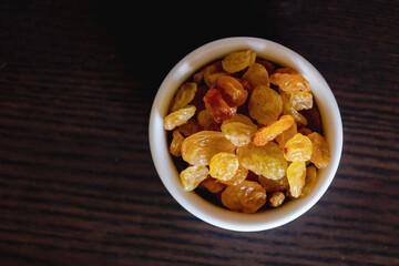 golden raisins close up in bowl