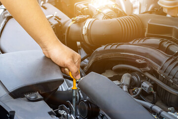 Auto mechanic or driver check system gear old car engine at service station,change and repair...