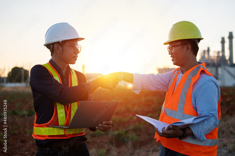 Poster architect and engineer working at the construction site and discussion with blueprint both looking v