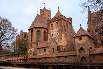 Fototapeta na wymiar The medieval Castle of the Teutonic Order in Malbork in the Pomerania region, Poland. This is the largest castle in the world measured by land area and a UNESCO World Heritage Site