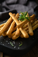 Crispy bread sticks with salt and rosemary