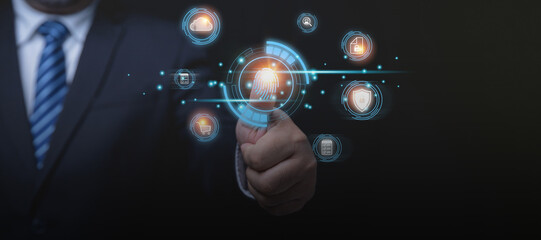 Businessman login by finger scan for protecting business data, and personal information from hackers. Use technology, cyber security data concept. IOT and internet technology.