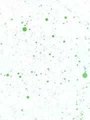 Splash green paint on white paper background.