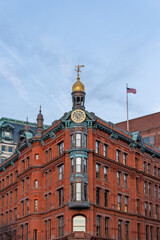 Bank Building in the financial sector of downtown was built in 1888 of red brick in the Queen Anne style and features terra cotta and copper ornamentation