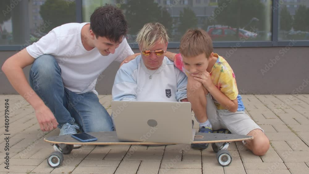 Poster the use of the educational application is using a laptop on a longboard. focus of attention in the m