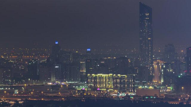 Buildings around Deira and creek district in Dubai night timelapse. Dubai, UAE.