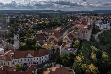 Fototapeta na wymiar Aerial view of the castle district in Veszprem Hungary with the walls, bastions bishop palace and other medieval building including the hero's gate and fire tower