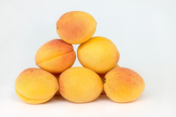 Apricots. Group of ripe apricots isolated on white background. Fruit